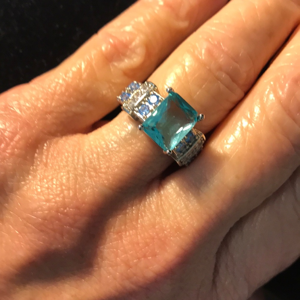 Ladies ring size 6. Light blue colored stone ring.